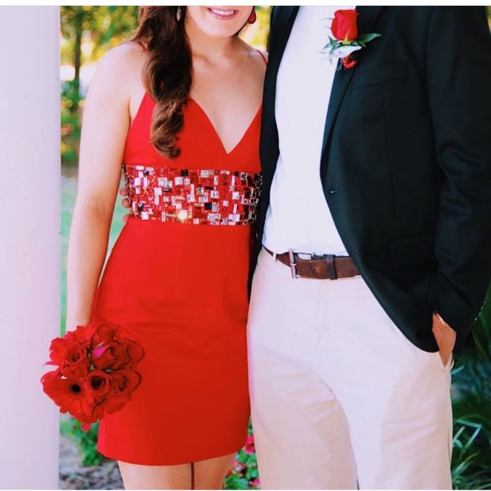 Red Sherri hill size 4